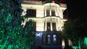 A multi-story building with balconies and a sign reading "VILLA VICTORIA HOTEL". - Hotel Villa Victoria (Tbilisi)