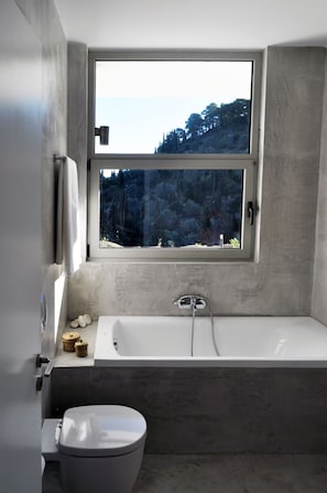 Villa | Bathroom | Bathtub, hair dryer, slippers, towels