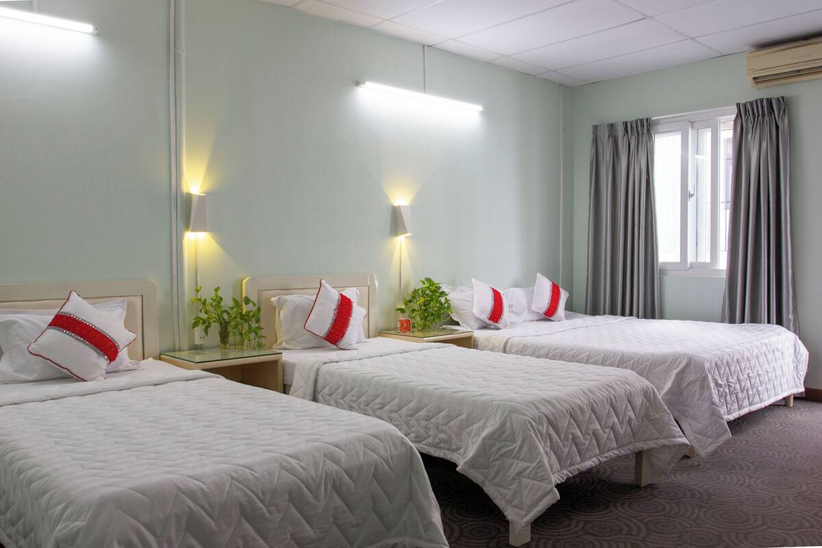 Family Studio, 1 Bedroom, City View | Desk, laptop workspace, blackout curtains, soundproofing