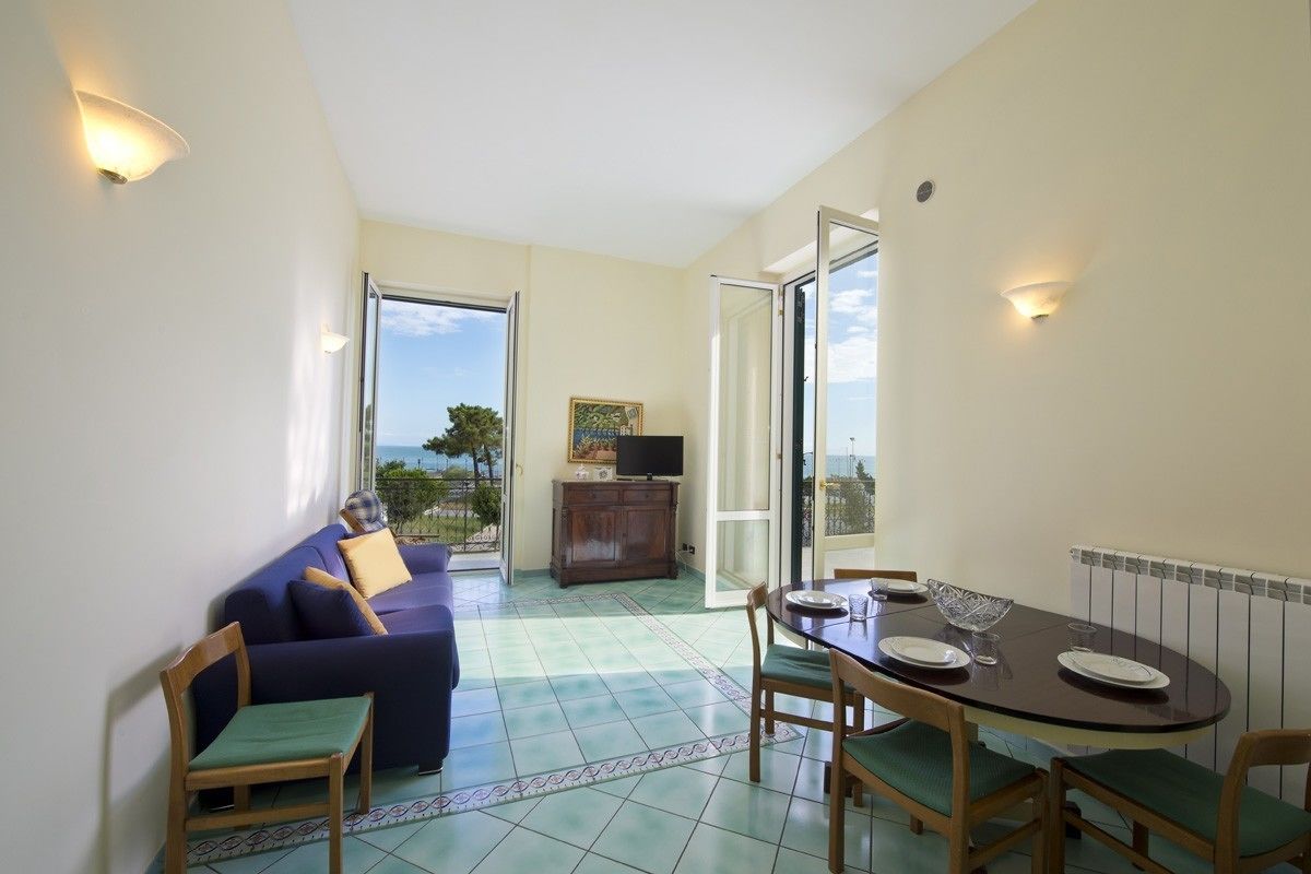 Appartement, 2 slaapkamers (Antonietta) | Woonkamer | Een flatscreentelevisie