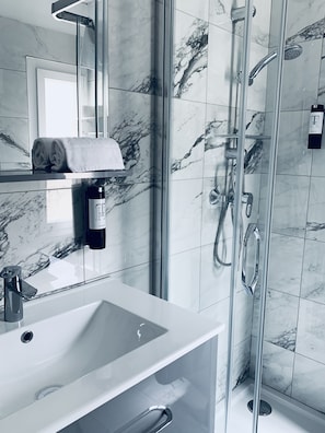 Shower, free toiletries, hair dryer, towels