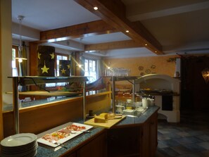 Daily buffet breakfast (EUR 18 per person)