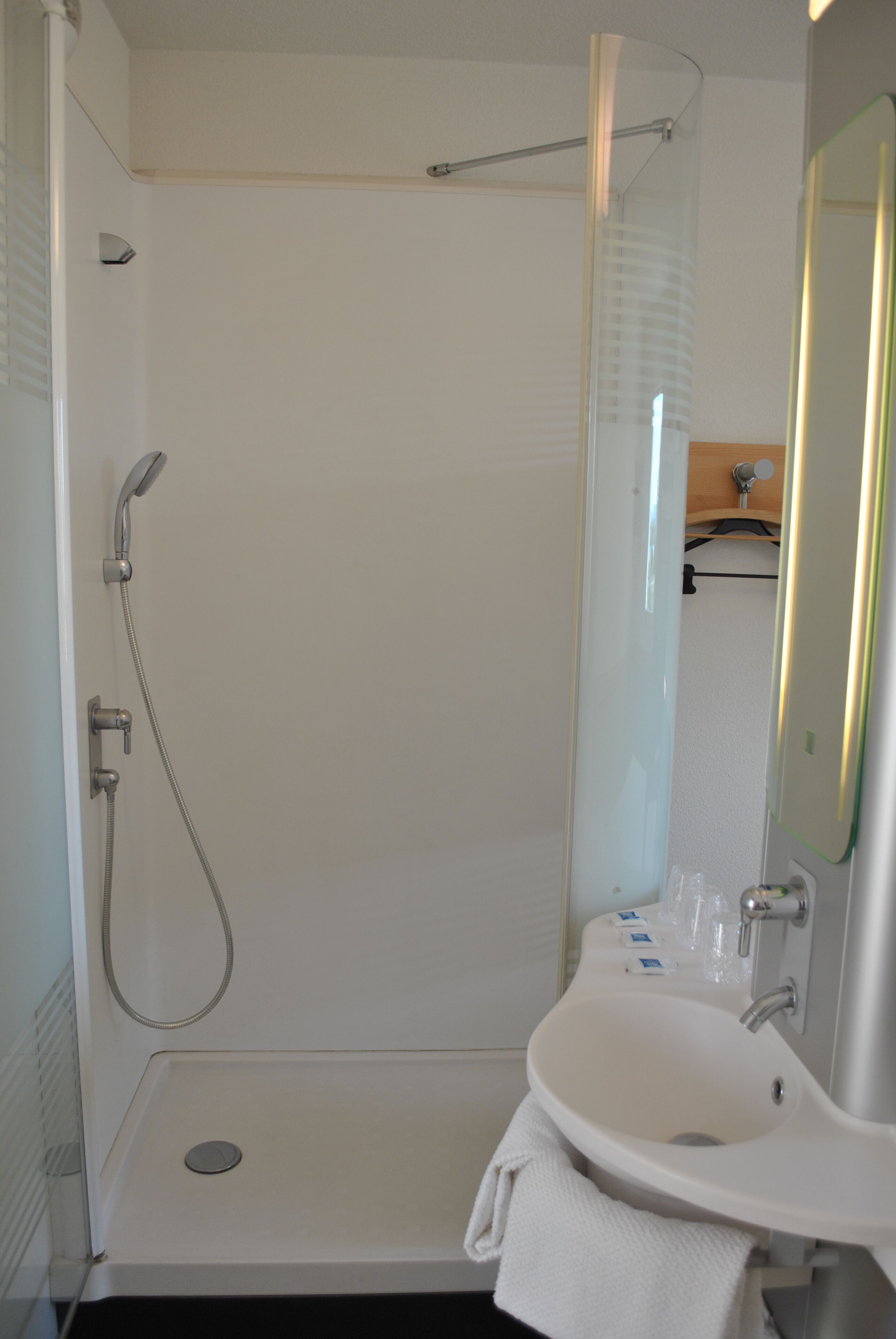 shower, eco-friendly toiletries, hair dryer, towels