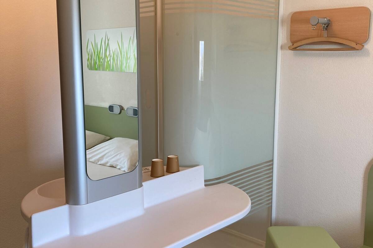 shower, eco-friendly toiletries, hair dryer, towels