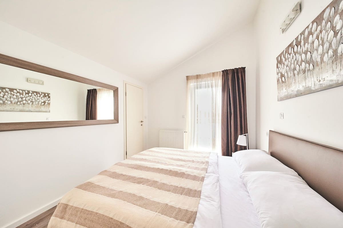 Superior Apartment with Balcony and Sea View | 2 bedrooms, in-room safe, desk, soundproofing