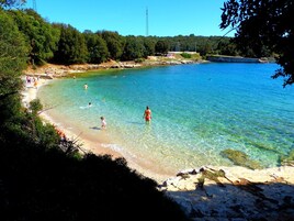 Beach nearby, white sand, 2 beach bars