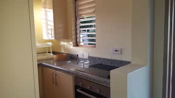 Superior Studio Suite, 1 Bedroom, Ensuite | Private kitchen | Full-size fridge, microwave, oven, stovetop