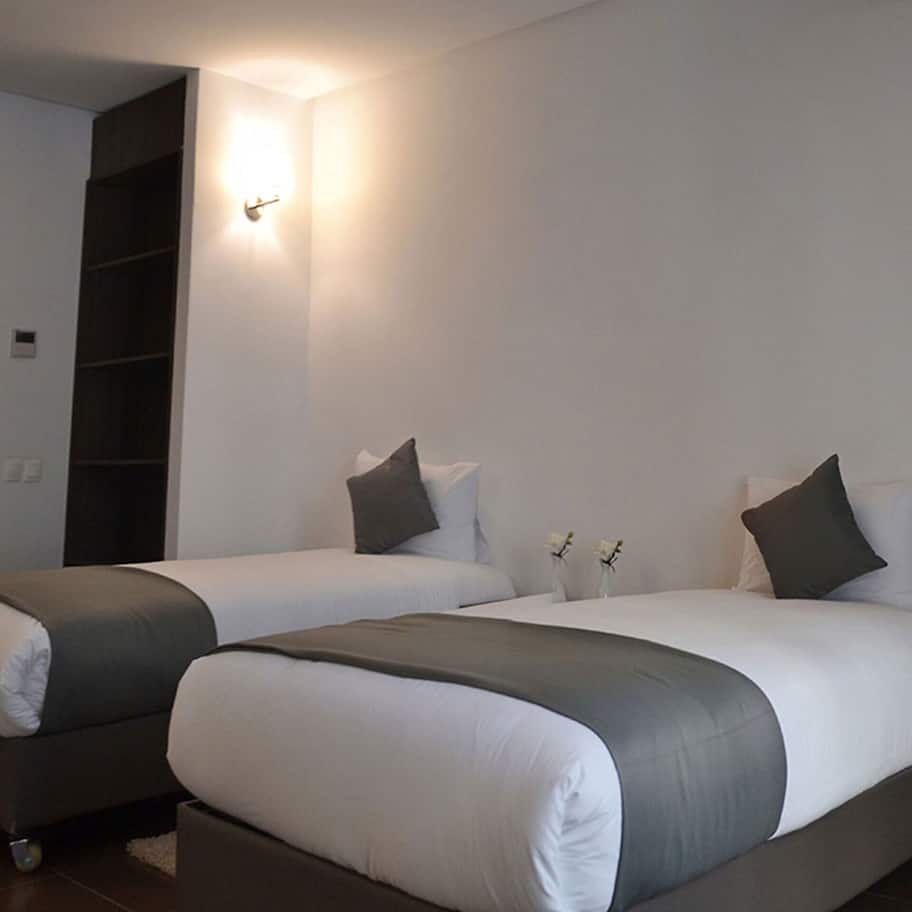 Quadruple Room | Minibar, in-room safe, blackout drapes, soundproofing