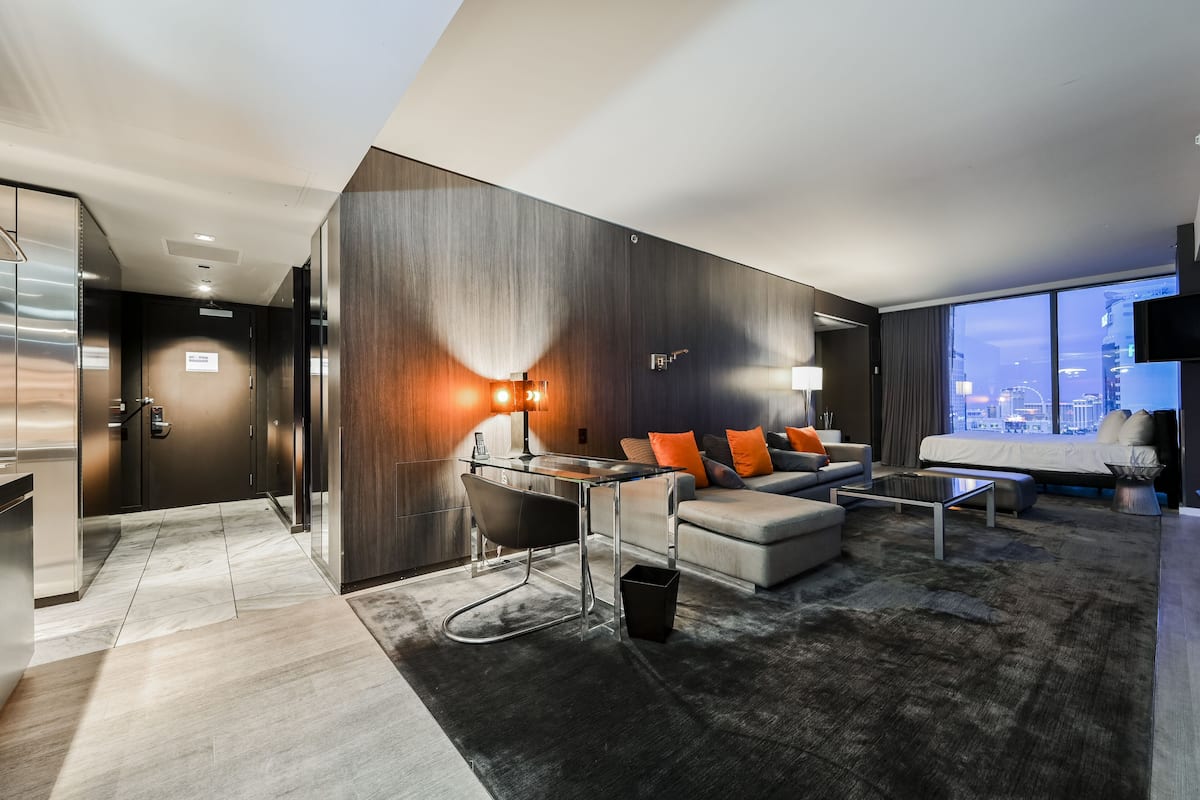 Two-Bedroom - Strip View & Balcony | Living area | 42-inch flat-screen TV with cable channels, TV