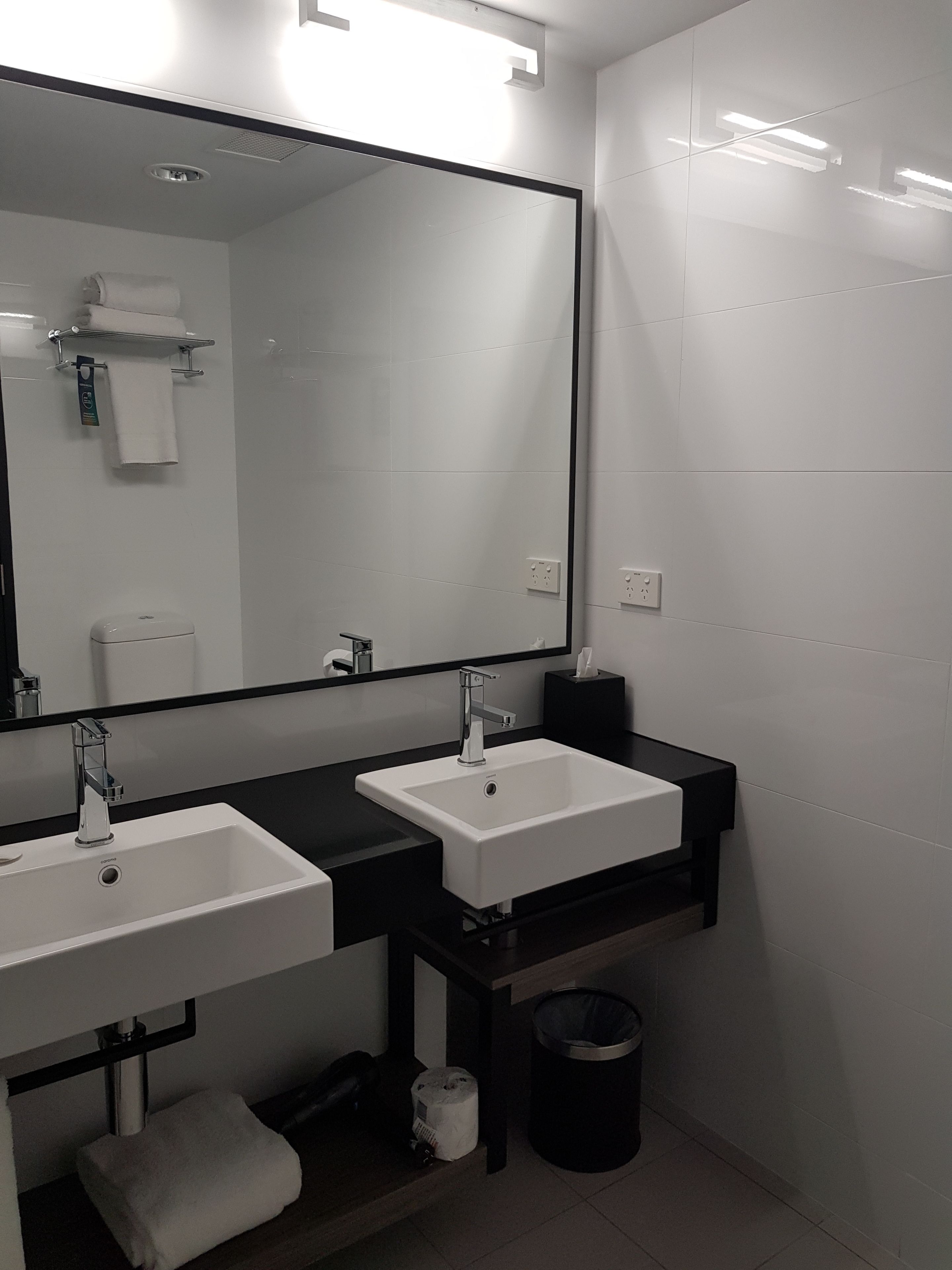 standard room, multiple beds (family) | bathroom sink