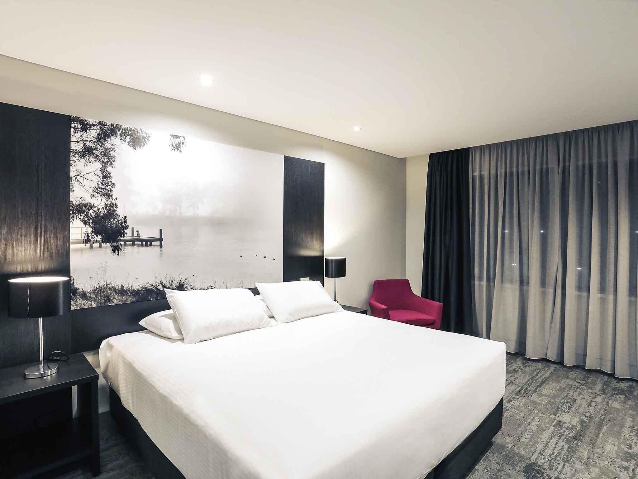 Standard Room, Multiple Beds (Family) | Minibar, in-room safe, desk, soundproofing