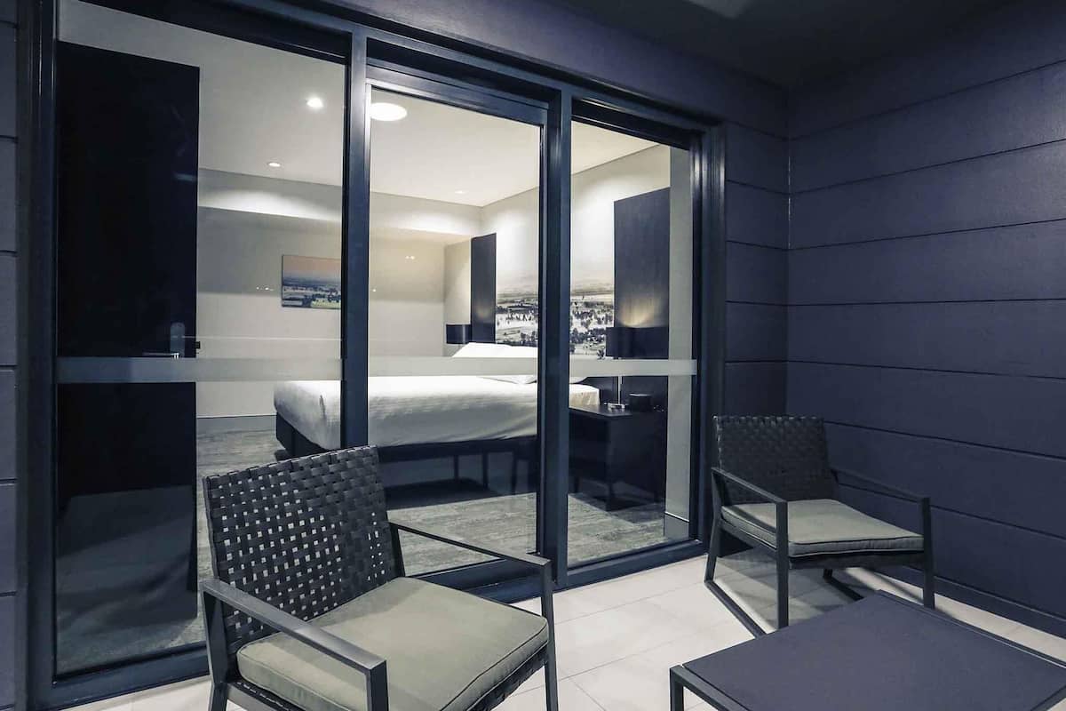 Apartment, 1 Queen Bed, Balcony (West End) | Minibar, in-room safe, desk, soundproofing