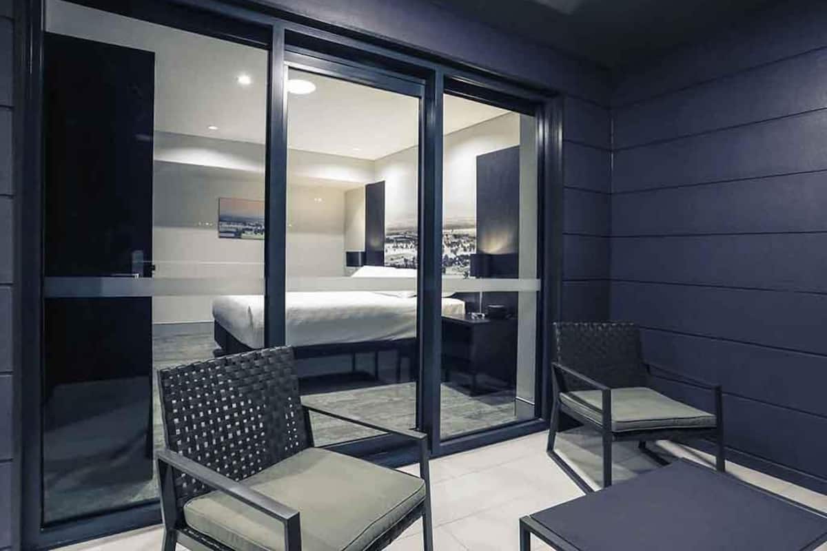 Apartment, 1 Queen Bed, Balcony (West End) | Minibar, in-room safe, desk, soundproofing