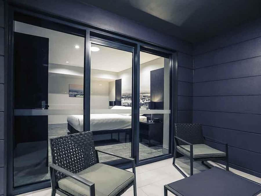 Apartment, 1 Queen Bed, Balcony (West End) | Minibar, in-room safe, desk, soundproofing