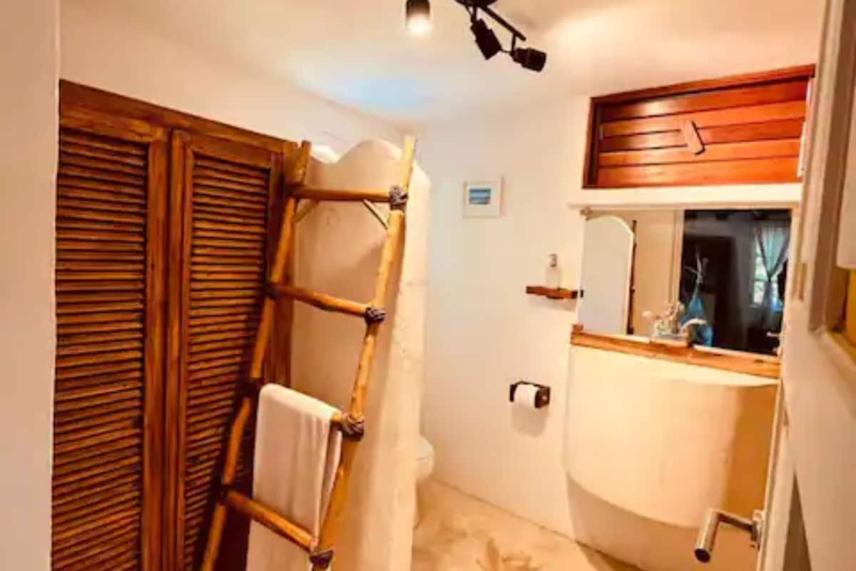 bungalow | bathroom | shower, towels, soap, shampoo