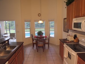 Fridge, microwave, oven, stovetop - Deluxe Pool Homes by SVV (Davenport)