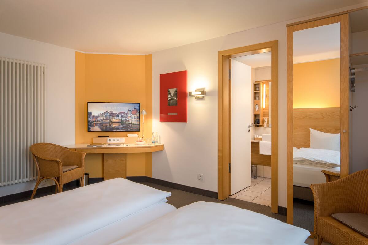 Economy Twin Room | In-room safe, desk, laptop workspace, iron/ironing board (on request)
