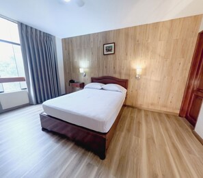 Basic Single Room, 1 Double Bed | Laptop workspace, blackout drapes, iron/ironing board (on request) - Asturias Inn (Lima)