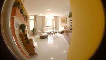 43-inch flat-screen TV with cable channels, TV