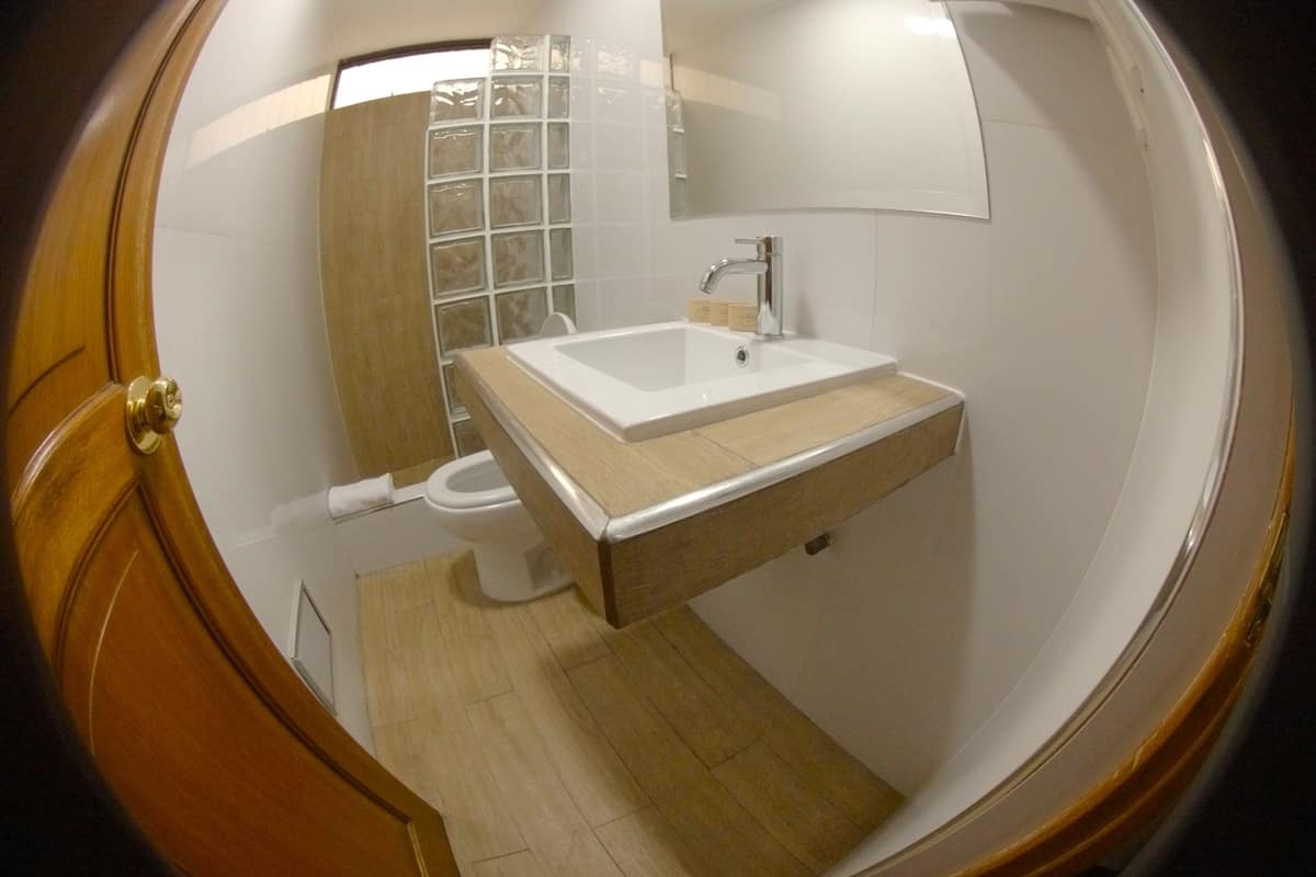 classic single room | bathroom | hair dryer, towels