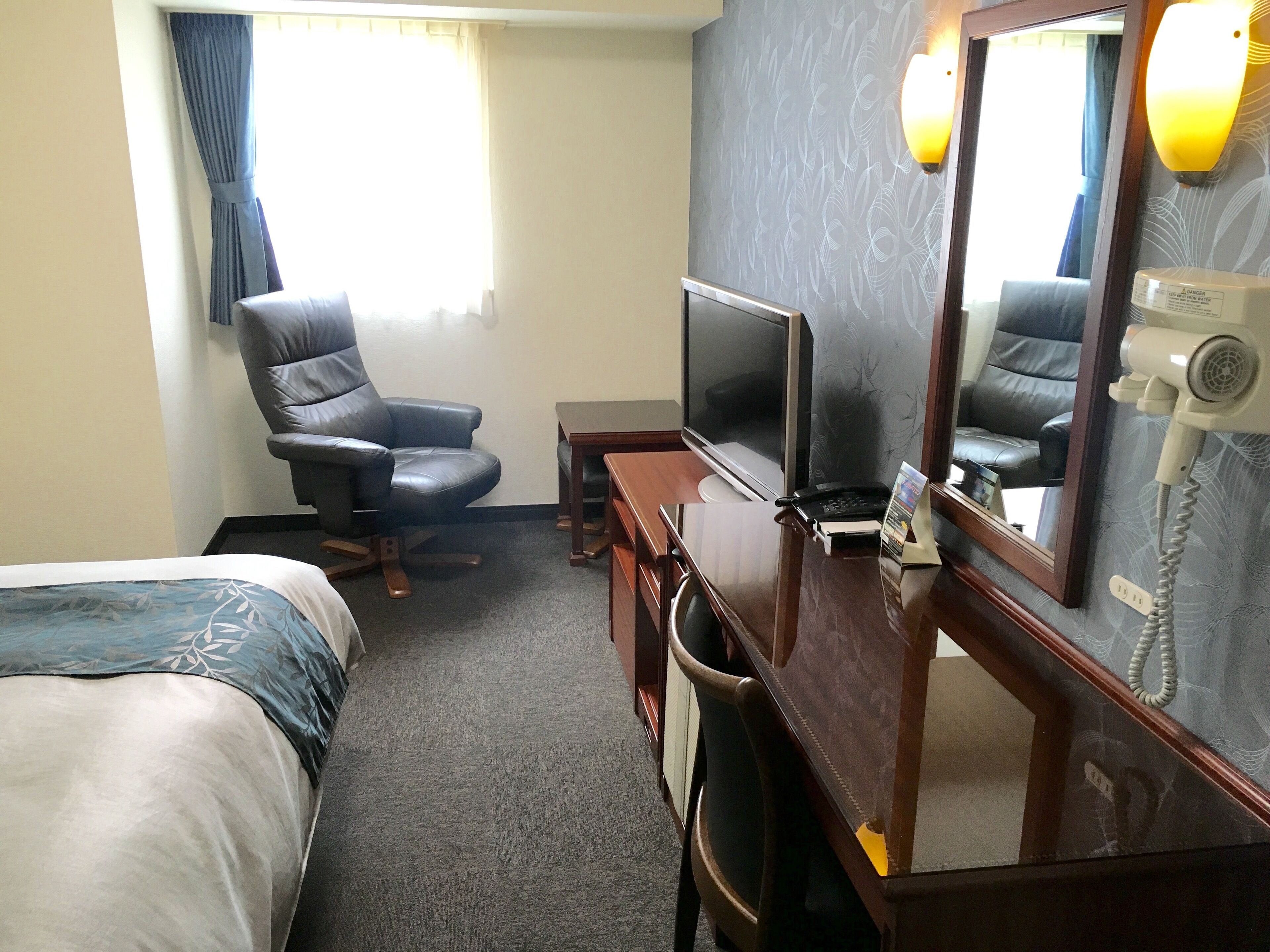 Desk, blackout curtains, soundproofing, iron/ironing board