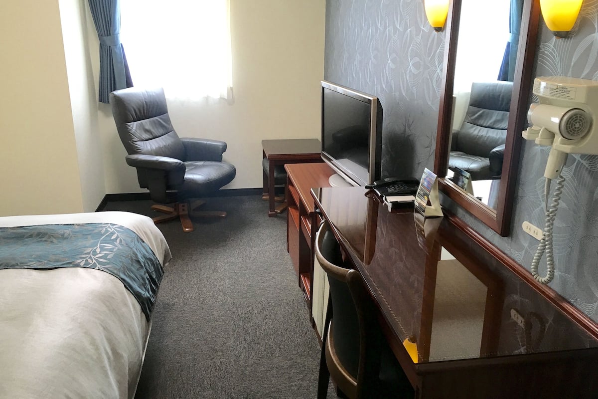 Desk, blackout drapes, soundproofing, iron/ironing board