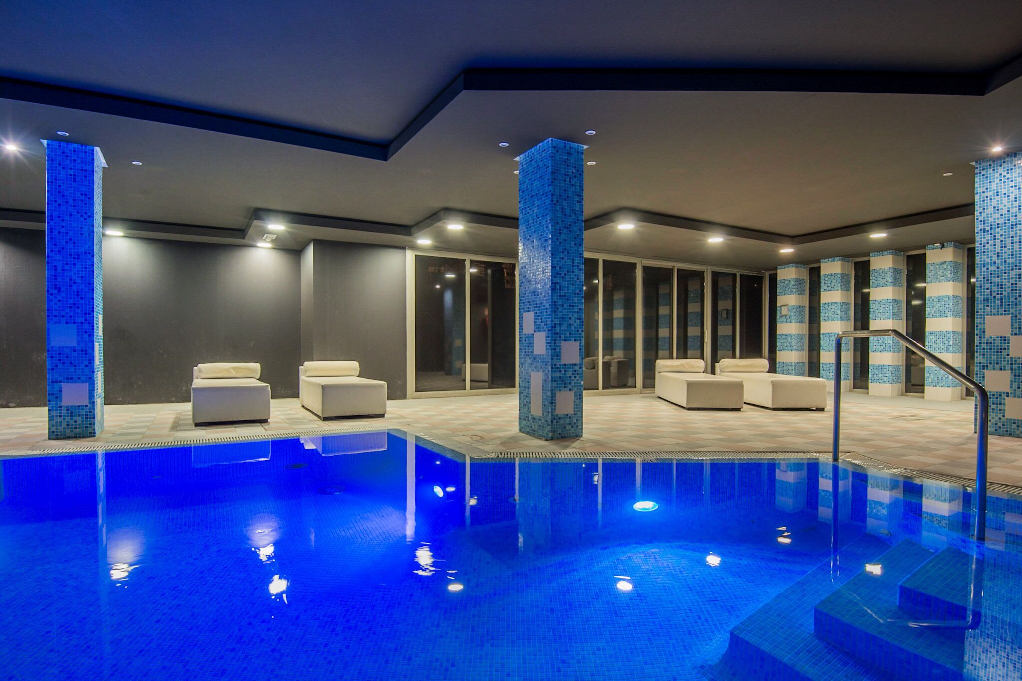 Indoor pool, outdoor pool, pool umbrellas, sun loungers