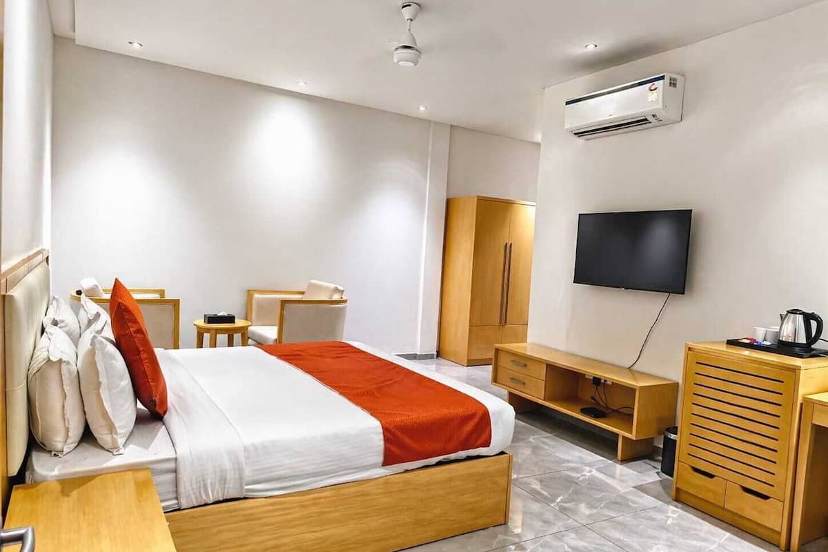 Chambre Deluxe double, 1 lit double | Coffre-fort, lit dâappoint (supplĂ©ment), accĂšs Ă Internet cĂąblĂ© (inclus)