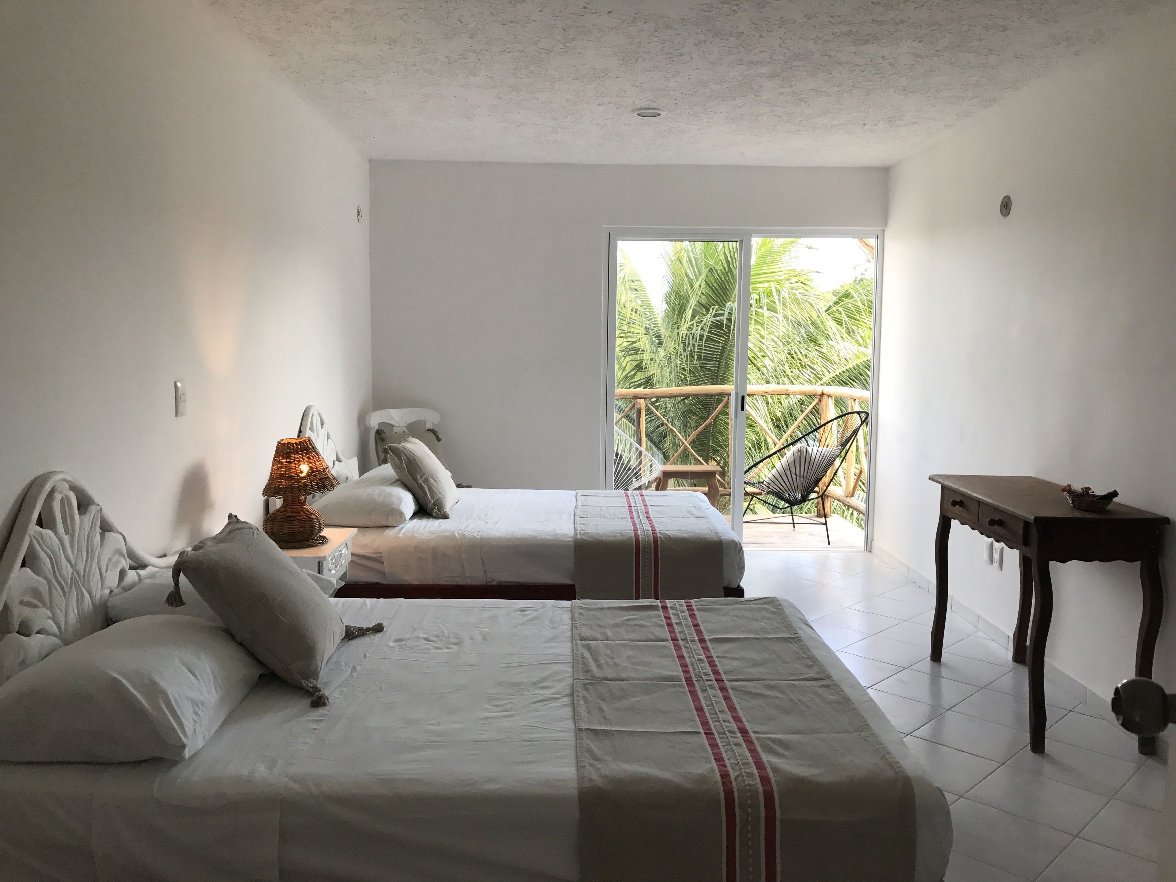 room, 2 queen beds, balcony, garden view | 1 bedroom, in-room safe, desk, free wifi