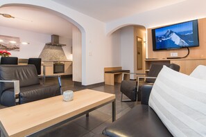Apartment, 3 Bedrooms, Kitchen, Mountain View | Living area | 55-inch flat-screen TV with cable channels, TV, DVD player - Ferienhaus Matterhorngruss (Zermatt)