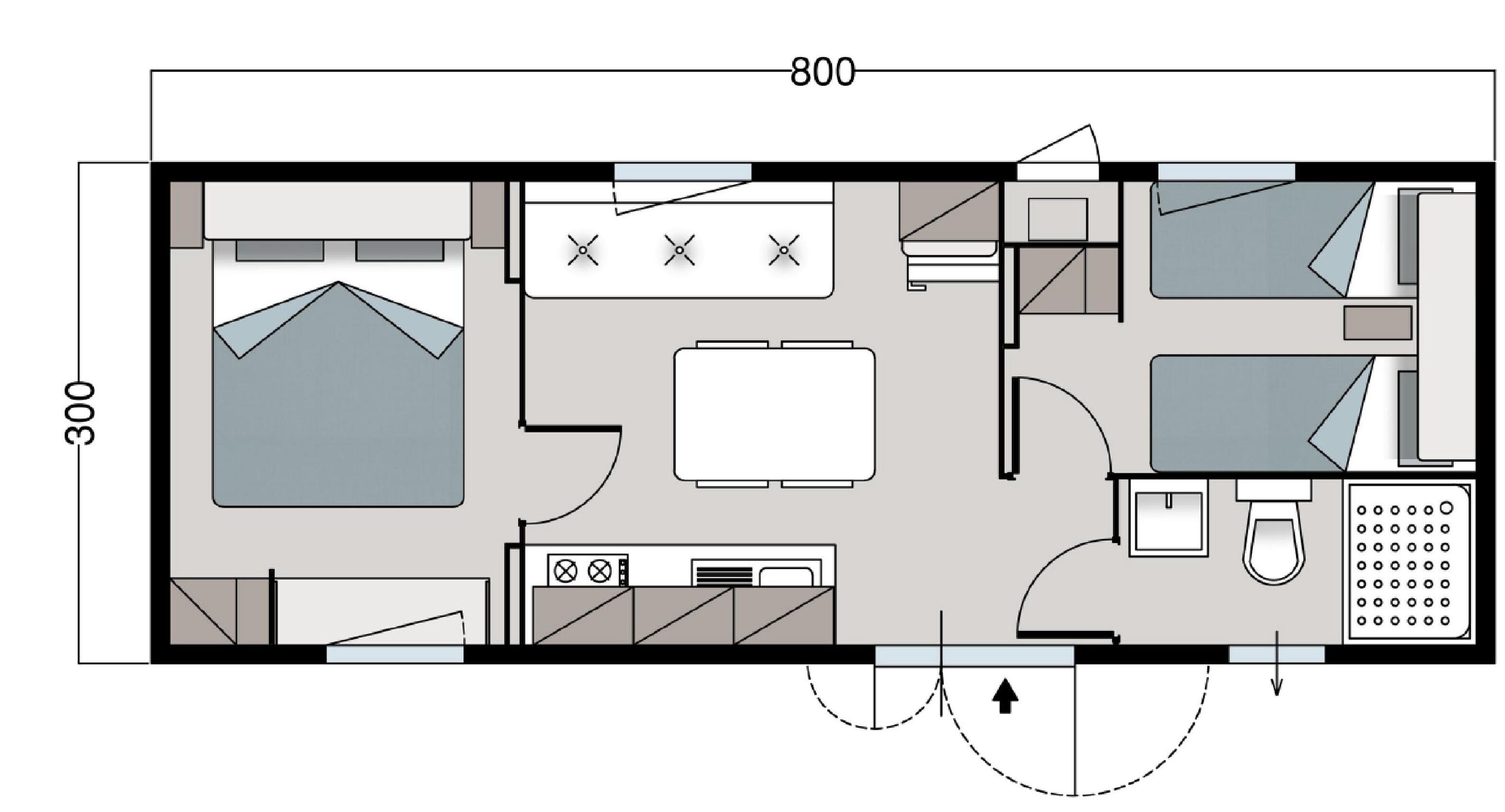 Planta baixa de um quarto de hotel com cama, escrivaninha, cadeira, mesa pequena, sofá, banheiro com vaso sanitário e pia, e chuveiro.
