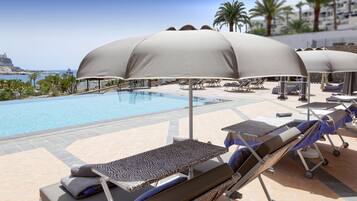 Outdoor pool, pool umbrellas, pool loungers