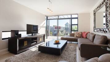 Double Room | Living area | Flat-screen TV, DVD player