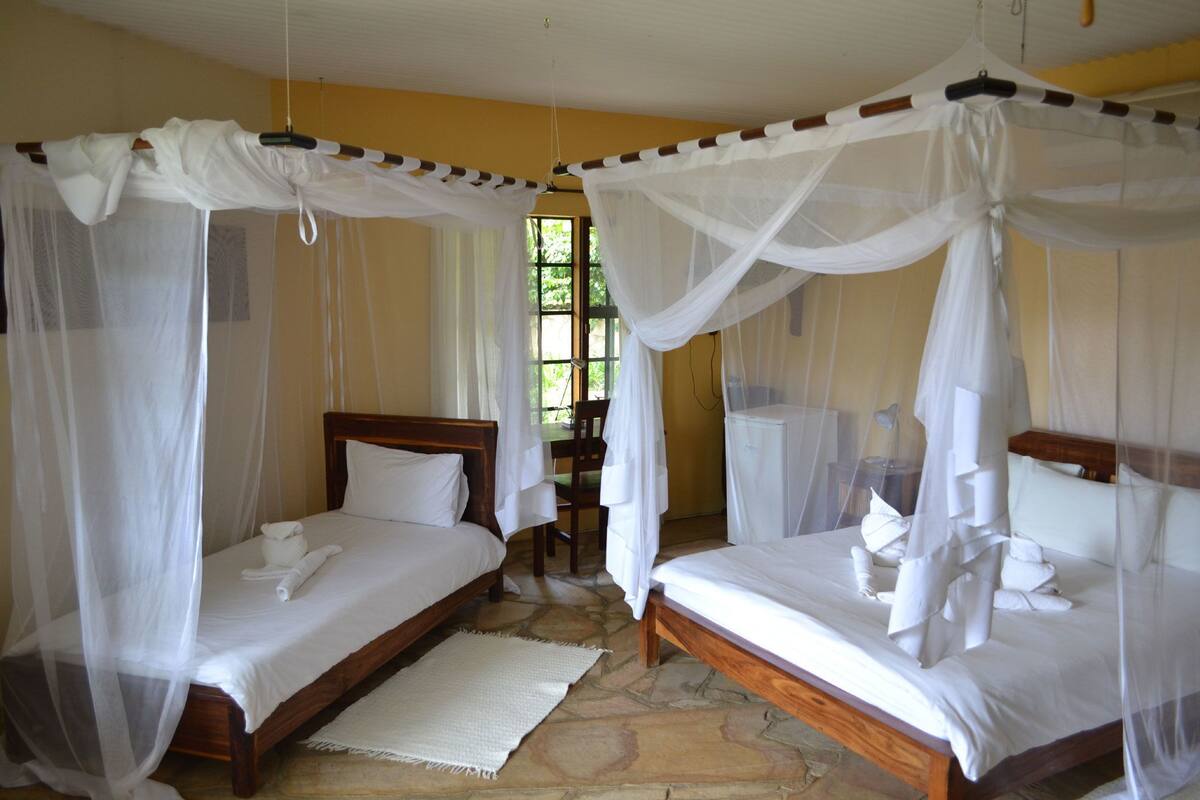 Family Room | Premium bedding, minibar, in-room safe, desk