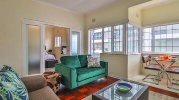 Apartment (1 Bedroom) | Living area | Flat-screen TV, DVD player