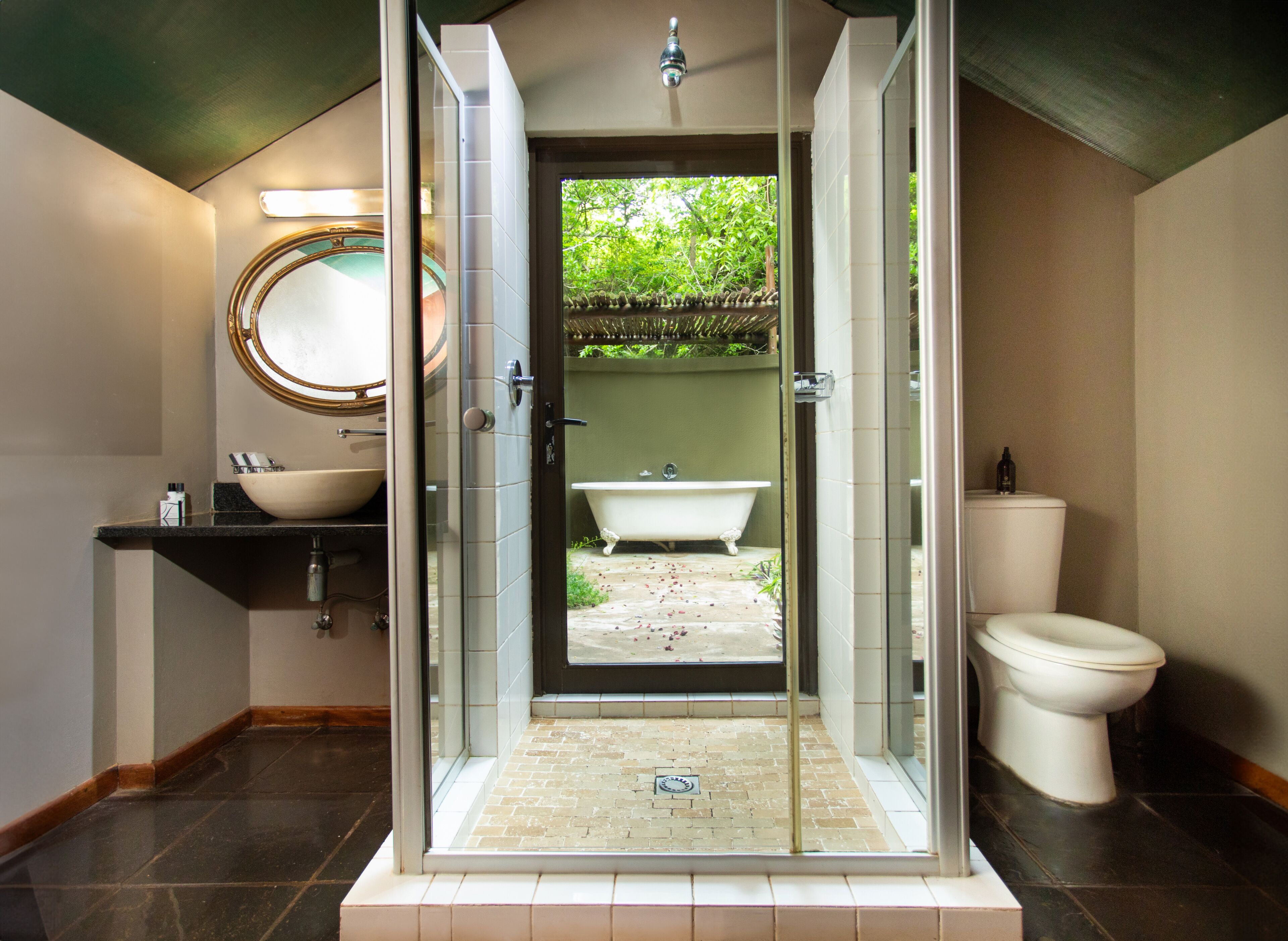 Luxury tented Accommodation twin | Bathroom | Shower, hair dryer, bathrobes, slippers
