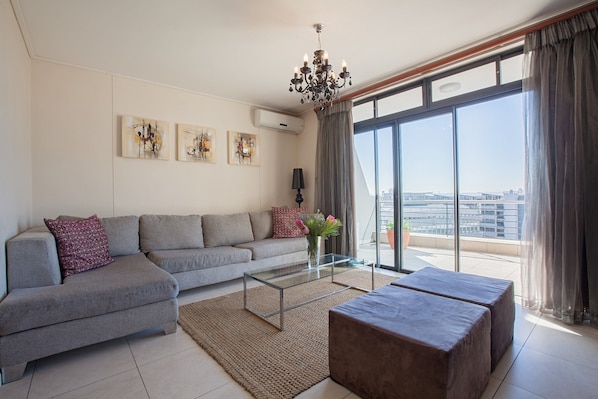 Classic Apartment | Living area | Flat-screen TV, DVD player