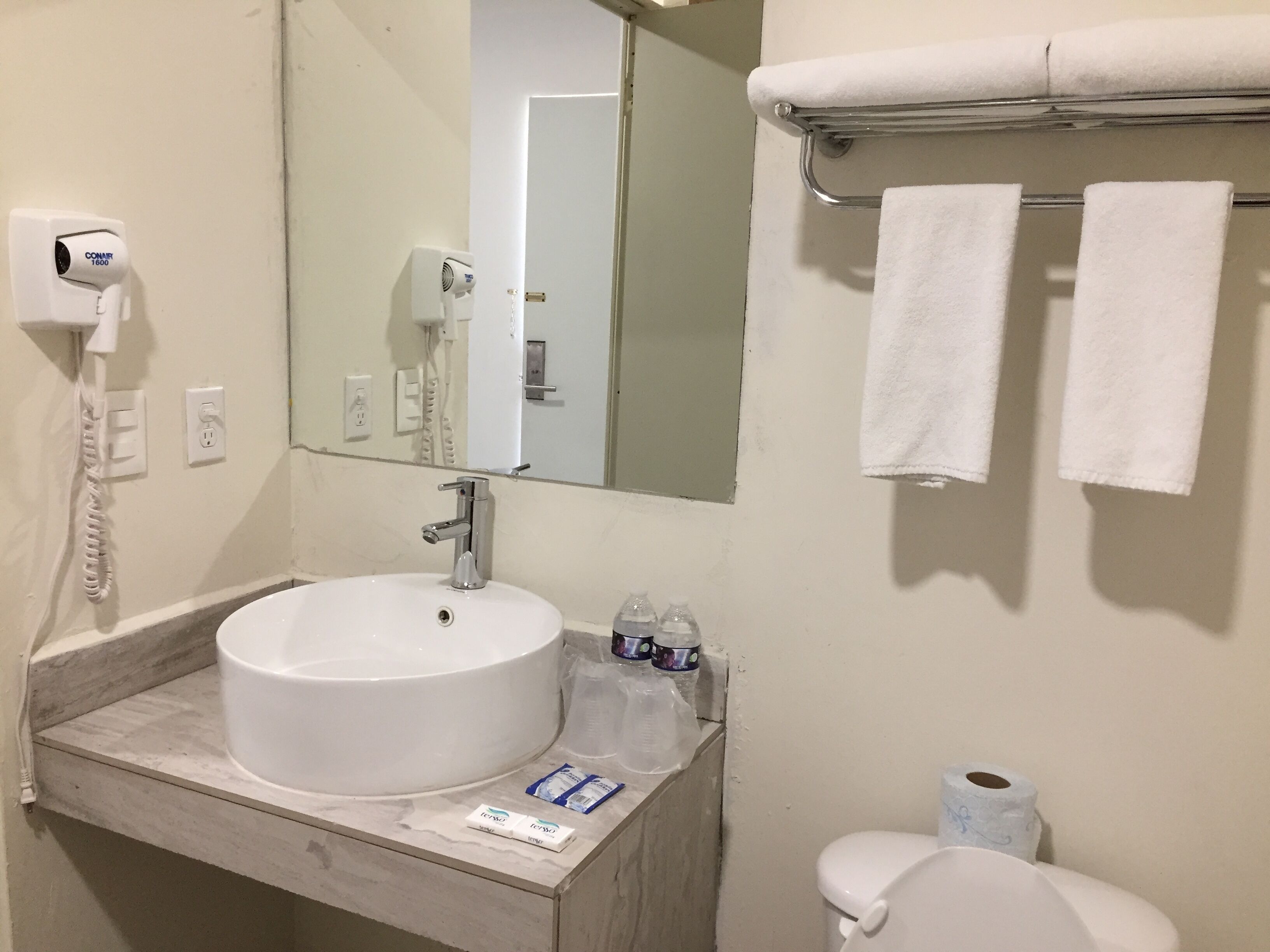 shower, designer toiletries, hair dryer, towels