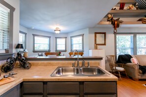 House, 1 Bedroom (Circle D Guest House) | Private kitchen | Full-sized fridge, microwave, stovetop, coffee/tea maker - Circle D Guesthouse (Fredericksburg)