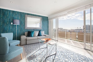 Appartement (2 Bedrooms) | Salle de séjour | Télévisions à écran plasma, Netflix, lecteur de DVD