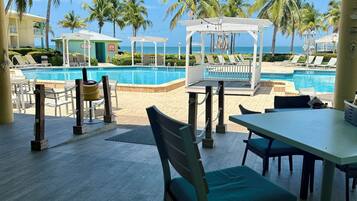 Breakfast, lunch, dinner served; international cuisine, pool views