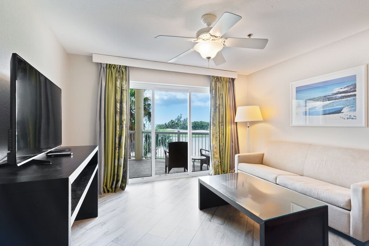One Bedroom King Suite- Island View | 1 bedroom, in-room safe, iron/ironing board, cribs/infant beds