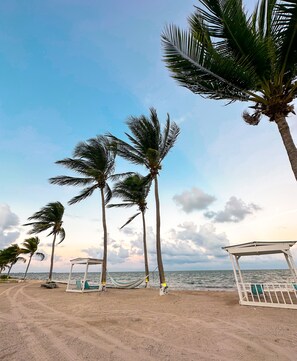 On the beach, free beach cabanas, sun-loungers, beach towels - The Grand Caymanian Resort (West Bay)