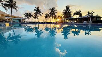 Outdoor pool, open 7:00 AM to 10:00 PM, pool umbrellas, sun loungers