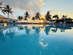Outdoor pool, open 7:00 AM to 10:00 PM, pool umbrellas, pool loungers