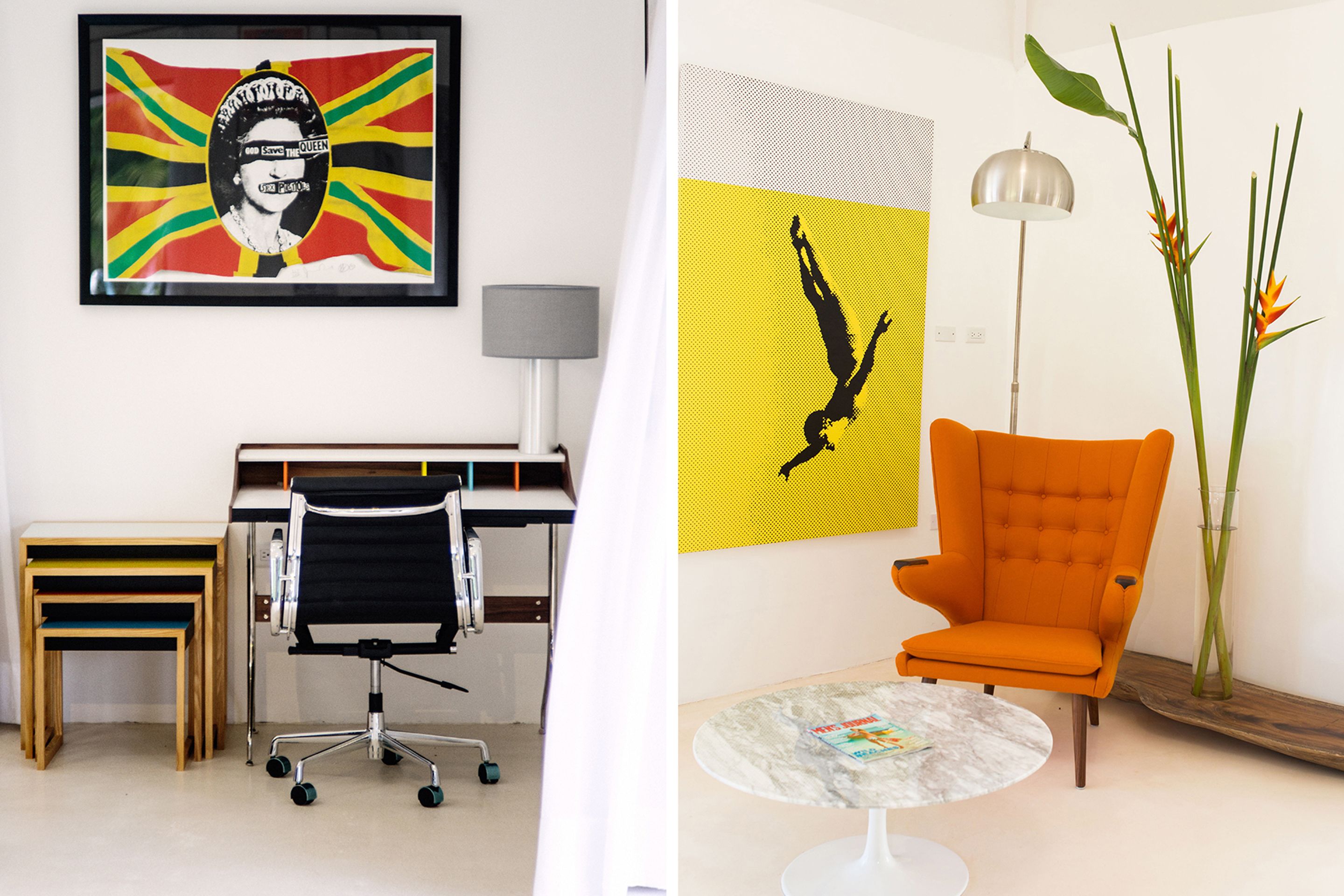 Ein modernes Büro mit Schreibtisch, Stuhl und gerahmten Kunstwerken.