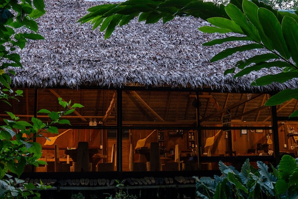 Breakfast, lunch, dinner served; local cuisine, garden views
