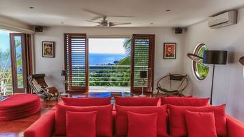 Luxury Villa, 6 Bedrooms, Ocean View | Living room | Flat-screen TV
