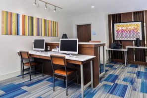 A conference room with two desktop computers, a whiteboard, and a storage area. - Holiday Inn Express & Suites Siloam Springs by IHG (Siloam Springs)