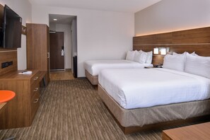 A hotel room with two beds, a TV, a desk with a chair, and a bathroom door. - Holiday Inn Express & Suites Siloam Springs by IHG (Siloam Springs)